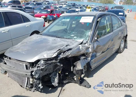 2004 Honda Civic Hybrid from USA, damaged, VIN JHMES96604S022802